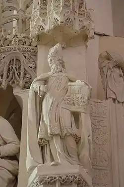 Fulbert présentant une maquette de la cathédrale, clôture du chœur.