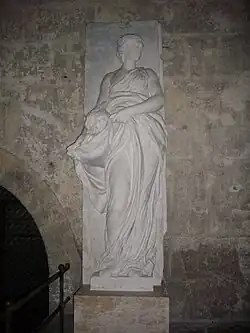 Allégorie de la Charité, accompagnée d'un pélican s'ouvrant le ventre, cathédrale Notre-Dame de Chartres.