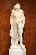 Victor Hugo jeune, statue située dans le hall du château des Roches.