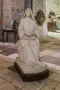 Thérèse assise (1919), copie de l'original à Villeneuve (Aveyron).