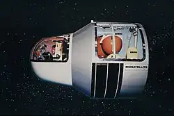 Description de l'image Cicra 1968 - 1969- Biosatellite model with monkey shown in the front of the capsule and the life spport package in the rear (ARC-1968-AR-1632B-452).jpg.