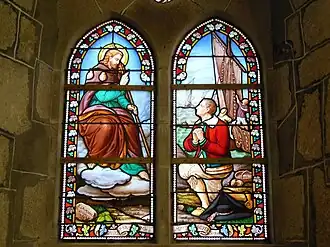 Vitrail représentant un pêcheur agenouillé devant saint Jacques.