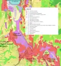 Carte de l'occupation des sols au sein de la cluse et des alentours. Comme on peut le voir, le fond plat de la cluse est très largement occupé par les habitations (en rouge) et les zones industrielles et commerciales (en violet).
