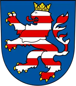 D’azur au lion burelé d’argent et de gueules.
