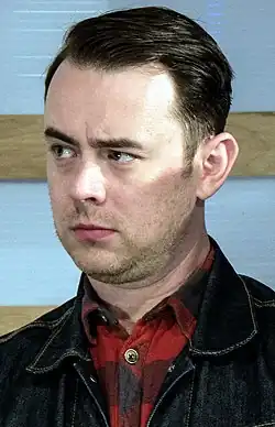 A photograph of Hanks at the premiere of All Things Must Pass at SXSW in 2015