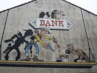 Peinture de Lucky Luke (à gauche) accompagné de Rantanplan (à droite), à Bruxelles.