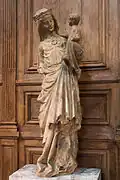 Statue de la Vierge au pied d'argent.