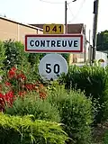 Panneau d'entrée du village.