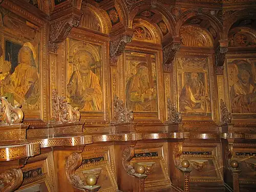 Chartreuse de Pavie. Détail du chœur Renaissance en bois : les stalles canoniales, 1486-1497.
