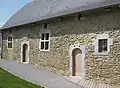 Façade de l'ancienne Cour de Justice de Hosdent du XVIIe&nbsp;siècle, rénovée en 2007.