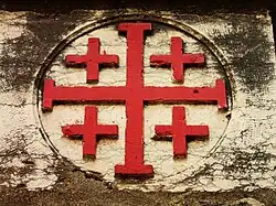 Croix de la custodie franciscaine de Terre sainte, représentant les cinq blessures du Christ.