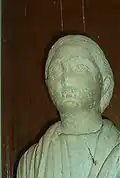 Détail de la statue de notable.