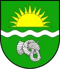 Commémoration des anciens occupants suèves du site, le nœud caractéristique du « chignon suève » est représenté sur les armes de la commune d’Osterby (Schleswig-Holstein)