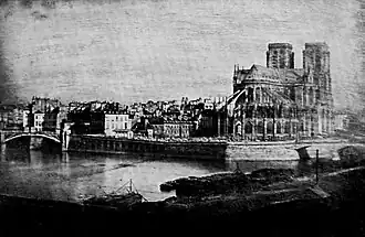 Passerelle en bois à deux arches. Daguerréotype, 1838 ou 1839.
