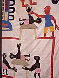 Détail d'une tenture à motifs appliqués