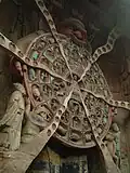 Roue de l'existence karmique. Sculpture rupestre de Dazu, Chine. Entre 1180 et 1250. Htr 8&nbsp;m.