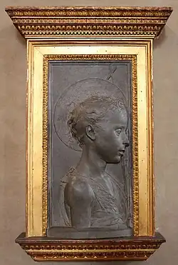 Saint Jean Baptiste jeune. Vers 1450-55. Relief. Pierre de Florence : macigno. H. 50 cm., env. 1450-55. De la Badia di Settimo. Musée national du Bargello