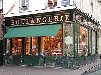 Devanture en verre églomisé d'une boutique du boulanger, classée monument historique.
