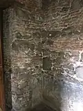 Différents matériaux de construction (au niveau du clocher).