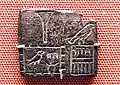 Petite étiquette en ivoire de Djer mentionnant le nom d'une forteresse ou d'un domaine du roi Hor-Djer-ib.