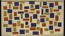Photographie d'un tableau représentant des quadrilatères multicolores sur un fond uni
