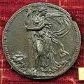 Verso de la médaille de Domenico Poggini qui reprend le thème du Courage dans le tableau de Jacopino del Conte