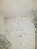 Drapeaux français et américain entrecroisés et surmontés d'une étoile.