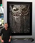 Tal exposant son travail intitulé Silence lors de la convention GlobalShop 2016 à Las Vegas