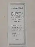 Plaque monument aux morts sur la mairie.