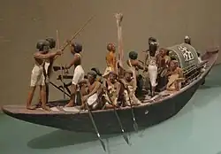 Modèle égyptien de bateau, 12e&nbsp;dynastie, Amenemhat j', New York, Metropolitan Museum of Art.