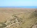 Désert au-dessus de  Tamchy, avec la péninsule de Choktal au fond.