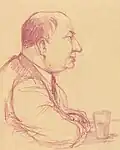 Homme attablé