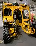 Enjambeur avec roues mobiles sur plusieurs axes.
