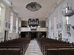 Vue intérieure de la nefvers la tribune d'orgue.