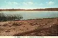 L'étang d'Ouée au début du XXe&nbsp;siècle (carte postale colorisée).