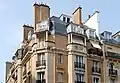 Immeuble d'angle (nos&nbsp;180) avec la rue Saint-Lambert.