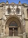 « Porte juive » avec le tympan de la Sainte Trinité (XVIe&nbsp;siècle)