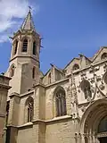 Clocher de 58&nbsp;m (de 1899 à 1902) et façade sud