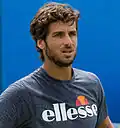 Feliciano López porte une Ellesse lors de l'entraînement aux championnats Aegon du Queen's Club à Londres.