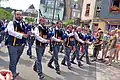 5 sonneurs de cornemuses ouvrant la marche