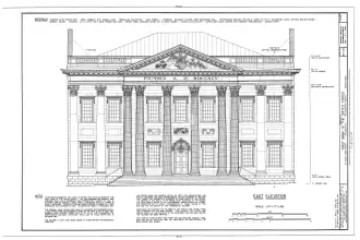Un plan du bâtiment dessiné, avec des mesures, une échelle, une description des matériaux et des notes.