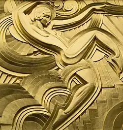 Danseuse style Art Deco géométrique, vue de profil un genou à terre, sujet et fond de courbes et angles à rendant, sont dorés à la feuille