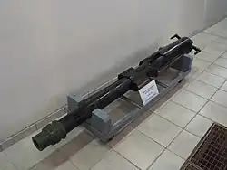 Pièce de 75&nbsp;mm avec culasse Nordenfeld.