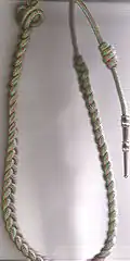 Fourragère française aux couleurs du ruban de la croix de guerre 1914-1918.