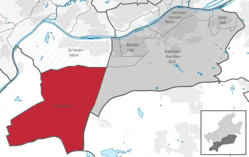Carte situant le quartier (en rouge) au sein l'arrondissement (en gris foncé) et du reste de la ville (en gris clair)