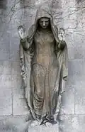 Sculpture d'une pleureuse.