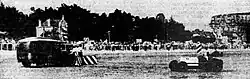 Photo illustrant une scène de course automobile.