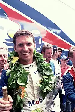 Description de l'image GT2 class winning Justin Bell - Chrysler Viper GTS-R celebrates in the paddock behind the pits at the 1998 Le Mans (51888007424).jpg.