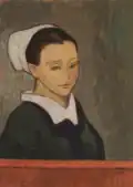 Une jeune bretonne à une table rouge (vers 1892).