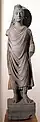 Bouddha debout, variante du type de la monnaie d'or de Kanishka au Bouddha. Schiste. Pakistan, IIe – IIIe&nbsp;siècle. MNAO Palais Brancaccio, Rome